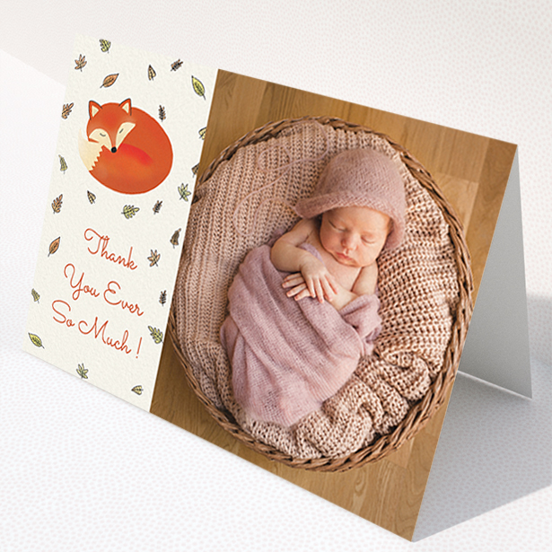 A baby card design named "Sleepy Fox". It is an A6 card in a landscape orientation. It is a photographic baby card with room for 1 photo. "Sleepy Fox" is available as a folded card, with tones of cream, orange and light yellow.