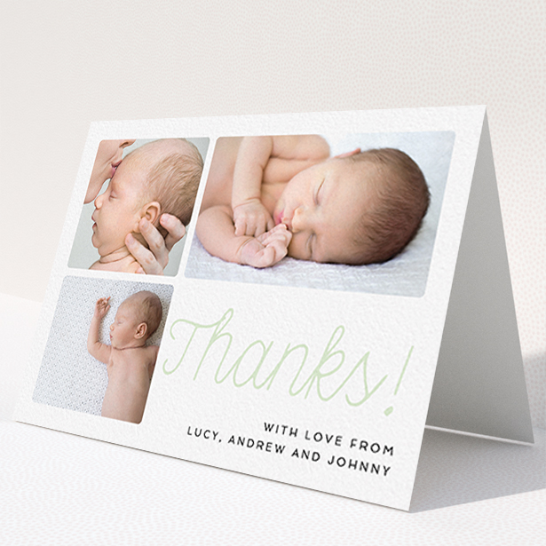 A baby card design named "Thank You Cursive". It is an A6 card in a landscape orientation. It is a photographic baby card with room for 3 photos. "Thank You Cursive" is available as a folded card, with tones of white and green.