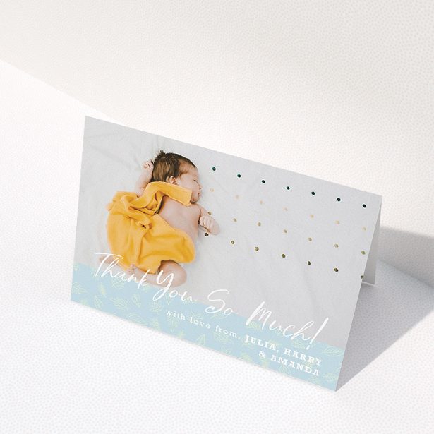 A baby card called "Thank You So Much". It is an A5 card in a landscape orientation. It is a photographic baby card with room for 1 photo. "Thank You So Much" is available as a folded card, with mainly blue colouring.