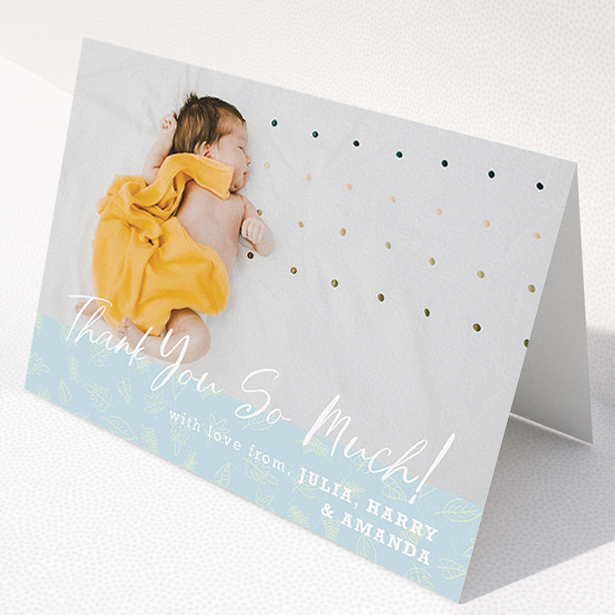 A baby card called "Thank You So Much". It is an A5 card in a landscape orientation. It is a photographic baby card with room for 1 photo. "Thank You So Much" is available as a folded card, with mainly blue colouring.