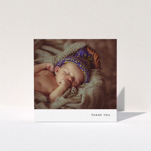 A baby card design titled "Thankful with Simplicity". It is a square (148mm x 148mm) card in a square orientation. It is a photographic baby card with room for 1 photo. "Thankful with Simplicity" is available as a folded card, with mainly white colouring.
