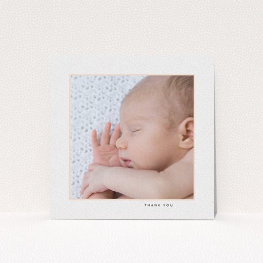 A baby card named "Thin Pink Frame". It is a square (148mm x 148mm) card in a square orientation. It is a photographic baby card with room for 1 photo. "Thin Pink Frame" is available as a flat card, with tones of white and pink.