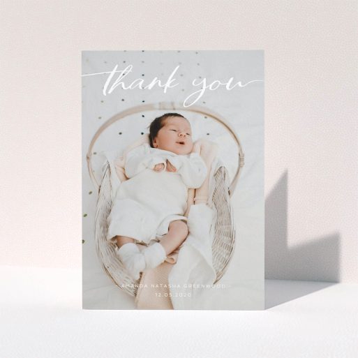 A baby card design titled "Topped and Bottomed". It is an A5 card in a portrait orientation. It is a photographic baby card with room for 1 photo. "Topped and Bottomed" is available as a folded card, with mainly white colouring.