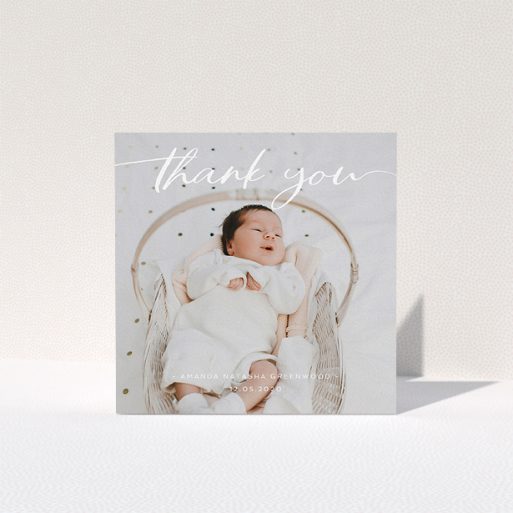 A baby card called "Topped and Bottomed". It is a square (148mm x 148mm) card in a square orientation. It is a photographic baby card with room for 1 photo. "Topped and Bottomed" is available as a folded card, with mainly white colouring.