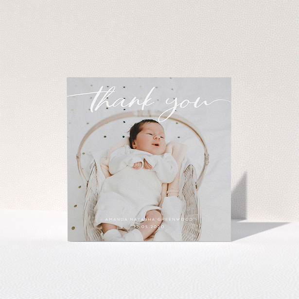 A baby card called "Topped and Bottomed". It is a square (148mm x 148mm) card in a square orientation. It is a photographic baby card with room for 1 photo. "Topped and Bottomed" is available as a folded card, with mainly white colouring.