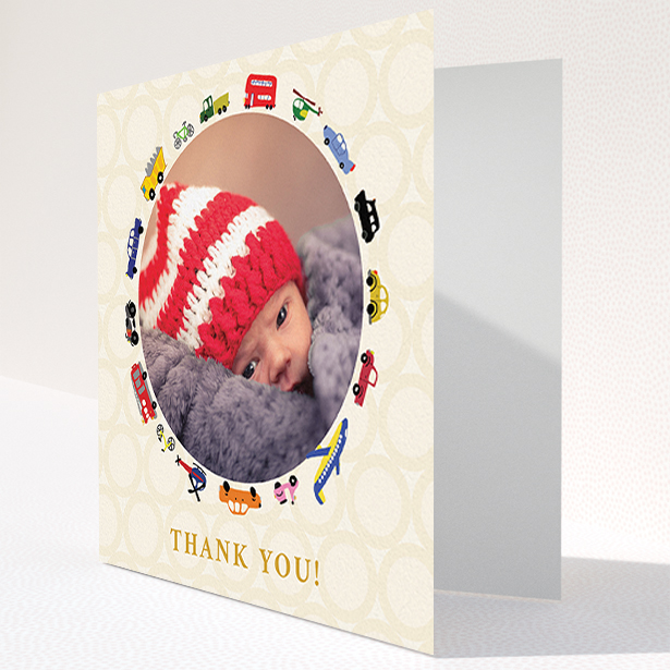 A baby card design titled "Toy Transport". It is a square (148mm x 148mm) card in a square orientation. It is a photographic baby card with room for 1 photo. "Toy Transport" is available as a folded card, with tones of cream, red and yellow.