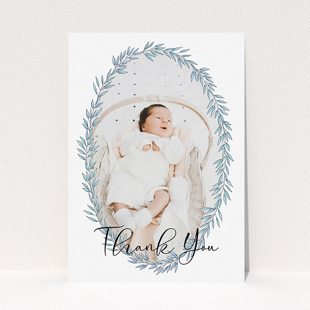 A baby card template titled "Tussled Wreath". It is an A5 card in a portrait orientation. It is a photographic baby card with room for 1 photo. "Tussled Wreath" is available as a flat card, with tones of blue and white.