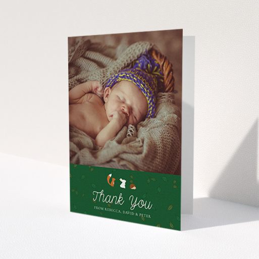 A baby card design titled 'Woodland Chums'. It is an A6 card in a portrait orientation. It is a photographic baby card with room for 1 photo. 'Woodland Chums' is available as a folded card, with tones of green, orange and brown.