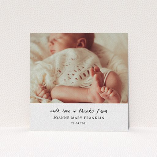 A baby thank you card design named "Black and White Thanks". It is a square (148mm x 148mm) card in a square orientation. It is a photographic baby thank you card with room for 1 photo. "Black and White Thanks" is available as a flat card, with mainly white colouring.