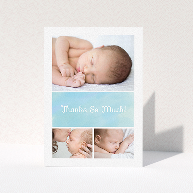 A baby thank you card template titled "Block Tower". It is an A6 card in a portrait orientation. It is a photographic baby thank you card with room for 3 photos. "Block Tower" is available as a folded card, with tones of blue and white.