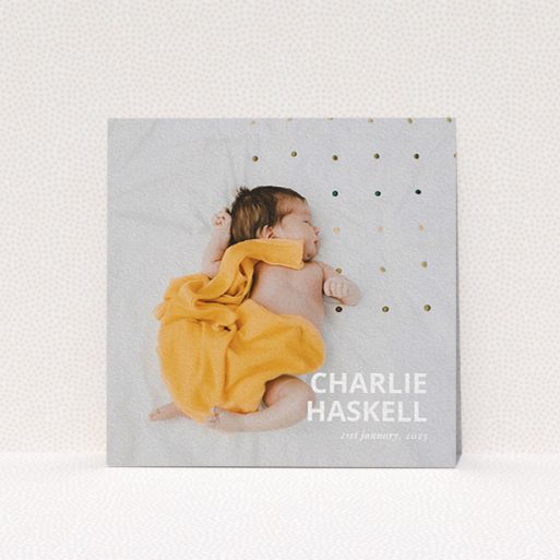 A baby thank you card called "Bold Photo Corner". It is a square (148mm x 148mm) card in a square orientation. It is a photographic baby thank you card with room for 1 photo. "Bold Photo Corner" is available as a flat card, with mainly white colouring.