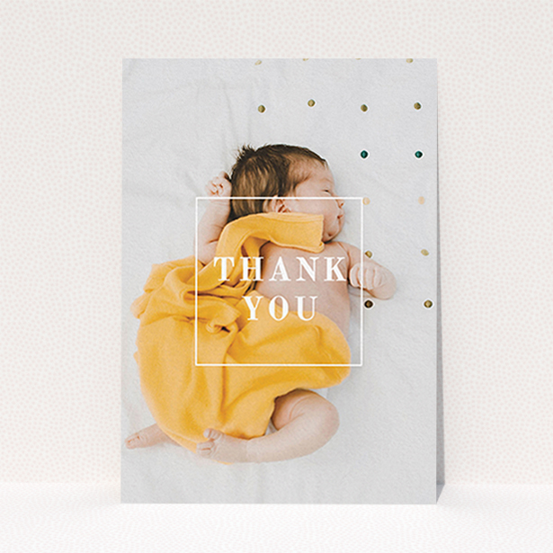 A baby thank you card design called "Central Thanks". It is an A6 card in a portrait orientation. It is a photographic baby thank you card with room for 1 photo. "Central Thanks" is available as a flat card, with mainly white colouring.