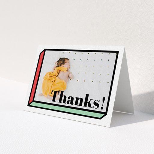 A baby thank you card design called 'Chip Off The Old Block'. It is an A6 card in a landscape orientation. It is a photographic baby thank you card with room for 1 photo. 'Chip Off The Old Block' is available as a folded card, with tones of green and red.