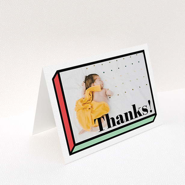 A baby thank you card design called "Chip Off The Old Block". It is an A6 card in a landscape orientation. It is a photographic baby thank you card with room for 1 photo. "Chip Off The Old Block" is available as a folded card, with tones of green and red.
