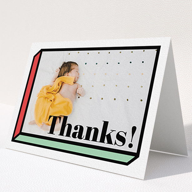 A baby thank you card design called "Chip Off The Old Block". It is an A6 card in a landscape orientation. It is a photographic baby thank you card with room for 1 photo. "Chip Off The Old Block" is available as a folded card, with tones of green and red.