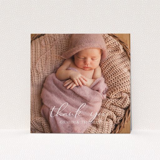 A baby thank you card named "Classic Thank You". It is a square (148mm x 148mm) card in a square orientation. It is a photographic baby thank you card with room for 1 photo. "Classic Thank You" is available as a flat card, with mainly white colouring.