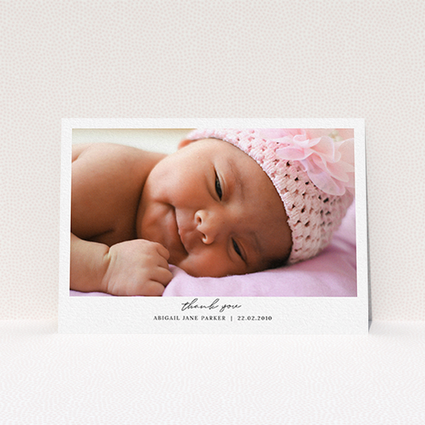 A baby thank you card design called "Everything You Need". It is an A6 card in a landscape orientation. It is a photographic baby thank you card with room for 1 photo. "Everything You Need" is available as a flat card, with mainly white colouring.