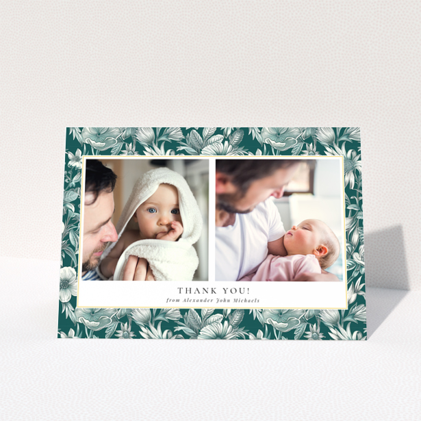 Baby thank you card with floral border and two photos of a baby with a parent.