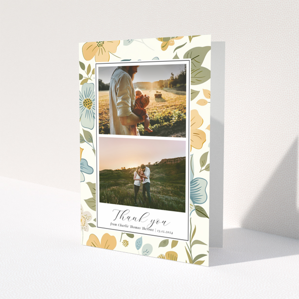 Floral baby thank you card design with two photos.