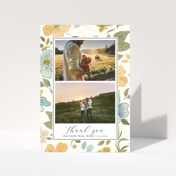 Floral baby thank you card design with two photos.