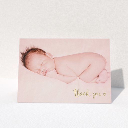 A baby thank you card template titled "Gold Thanks". It is an A5 card in a landscape orientation. It is a photographic baby thank you card with room for 1 photo. "Gold Thanks" is available as a folded card, with mainly gold colouring.