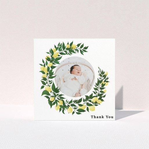 A baby thank you card design named "Lemon Wreath". It is a square (148mm x 148mm) card in a square orientation. It is a photographic baby thank you card with room for 1 photo. "Lemon Wreath" is available as a folded card, with tones of green and yellow.