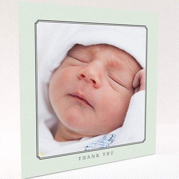 A baby thank you card called "Mint Deco". It is a square (148mm x 148mm) card in a square orientation. It is a photographic baby thank you card with room for 1 photo. "Mint Deco" is available as a folded card, with mainly green colouring.