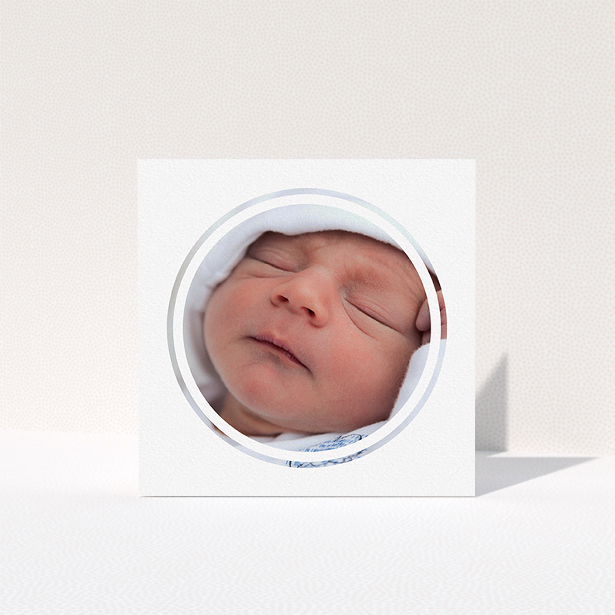 A baby thank you card template titled "Modern Circle Frame". It is a square (148mm x 148mm) card in a square orientation. It is a photographic baby thank you card with room for 1 photo. "Modern Circle Frame" is available as a folded card, with mainly white colouring.