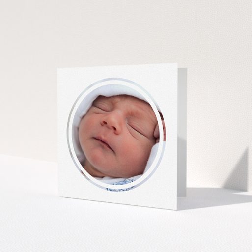 A baby thank you card template titled 'Modern Circle Frame'. It is a square (148mm x 148mm) card in a square orientation. It is a photographic baby thank you card with room for 1 photo. 'Modern Circle Frame' is available as a folded card, with mainly white colouring.