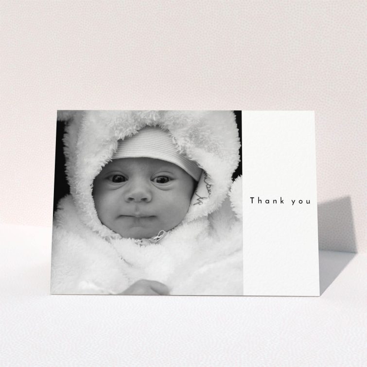 A baby thank you card design called "Most of the Page Frame". It is an A5 card in a landscape orientation. It is a photographic baby thank you card with room for 1 photo. "Most of the Page Frame" is available as a folded card, with mainly white colouring.
