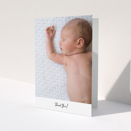A baby thank you card design named 'Mr & Mrs Footer'. It is an A5 card in a portrait orientation. It is a photographic baby thank you card with room for 1 photo. 'Mr & Mrs Footer' is available as a folded card, with mainly white colouring.