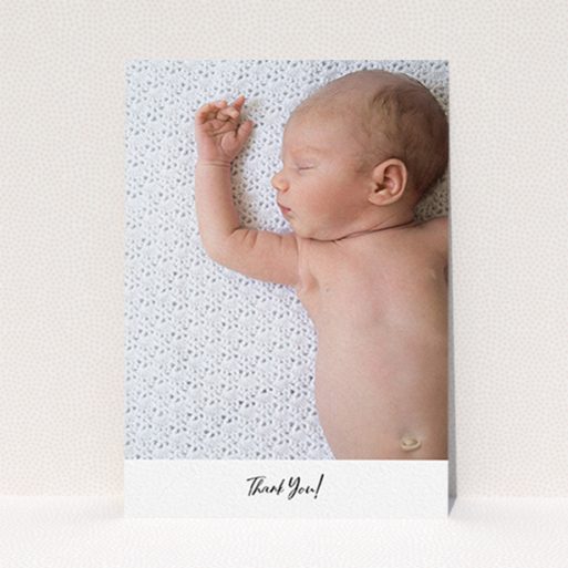 A baby thank you card named "Mr & Mrs Footer". It is an A6 card in a portrait orientation. It is a photographic baby thank you card with room for 1 photo. "Mr & Mrs Footer" is available as a flat card, with mainly white colouring.