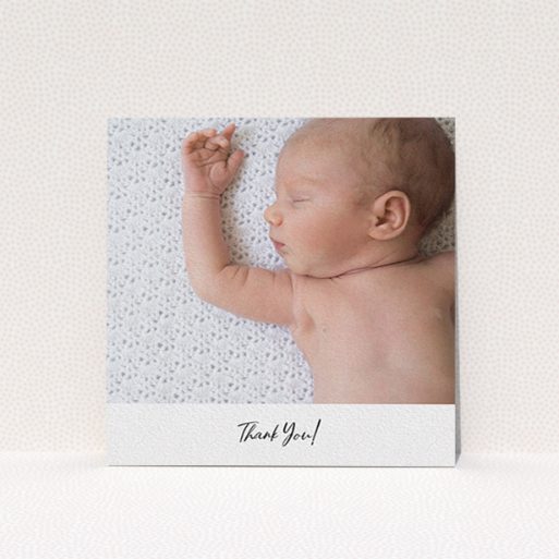 A baby thank you card design titled "Mr & Mrs Footer". It is a square (148mm x 148mm) card in a square orientation. It is a photographic baby thank you card with room for 1 photo. "Mr & Mrs Footer" is available as a flat card, with mainly white colouring.