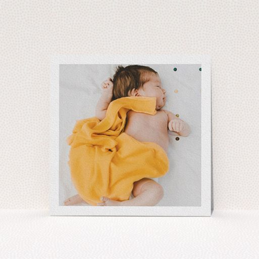 A baby thank you card design called "One Photo Thanks". It is a square (148mm x 148mm) card in a square orientation. It is a photographic baby thank you card with room for 1 photo. "One Photo Thanks" is available as a flat card, with mainly white colouring.