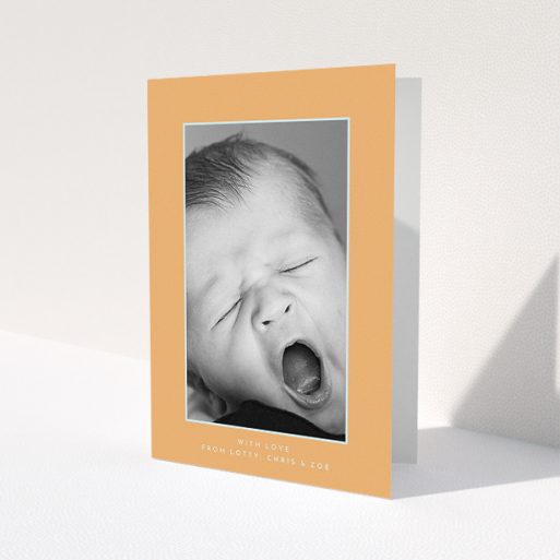 A baby thank you card named 'Orange and Mint'. It is an A5 card in a portrait orientation. It is a photographic baby thank you card with room for 1 photo. 'Orange and Mint' is available as a folded card, with tones of orange and blue.