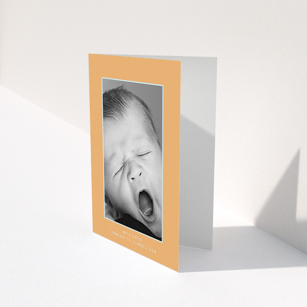 A baby thank you card named "Orange and Mint". It is an A5 card in a portrait orientation. It is a photographic baby thank you card with room for 1 photo. "Orange and Mint" is available as a folded card, with tones of orange and blue.