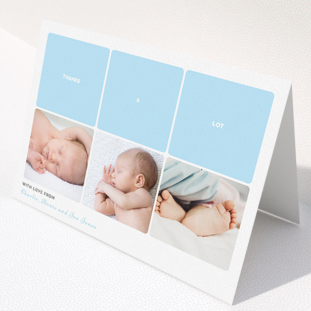 A baby thank you card design called "Our Little One". It is an A5 card in a landscape orientation. It is a photographic baby thank you card with room for 3 photos. "Our Little One" is available as a folded card, with tones of blue and white.