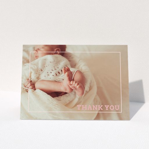 A baby thank you card template titled "Over Photo Frame". It is an A5 card in a landscape orientation. It is a photographic baby thank you card with room for 1 photo. "Over Photo Frame" is available as a folded card, with mainly white colouring.