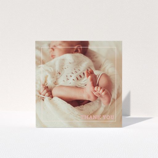 A baby thank you card design titled "Over Photo Frame". It is a square (148mm x 148mm) card in a square orientation. It is a photographic baby thank you card with room for 1 photo. "Over Photo Frame" is available as a folded card, with mainly white colouring.