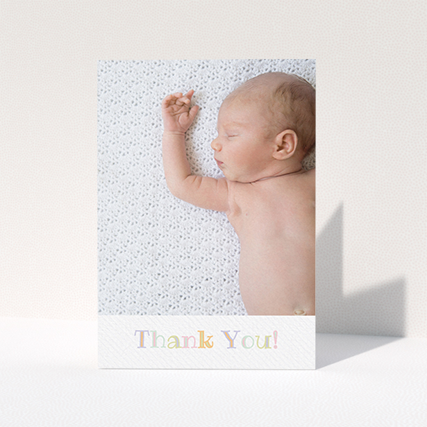 A baby thank you card template titled "Pastel Thank You". It is an A6 card in a portrait orientation. It is a photographic baby thank you card with room for 1 photo. "Pastel Thank You" is available as a folded card, with tones of white and green.