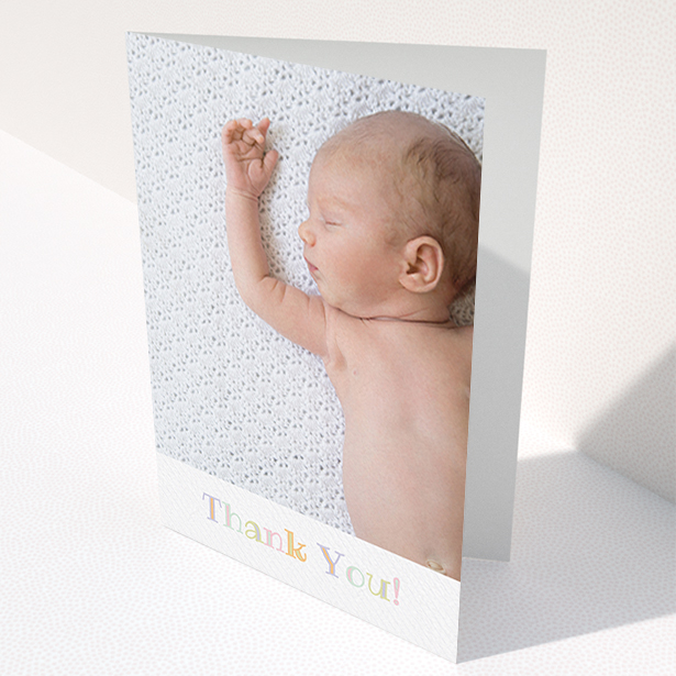 A baby thank you card template titled "Pastel Thank You". It is an A6 card in a portrait orientation. It is a photographic baby thank you card with room for 1 photo. "Pastel Thank You" is available as a folded card, with tones of white and green.