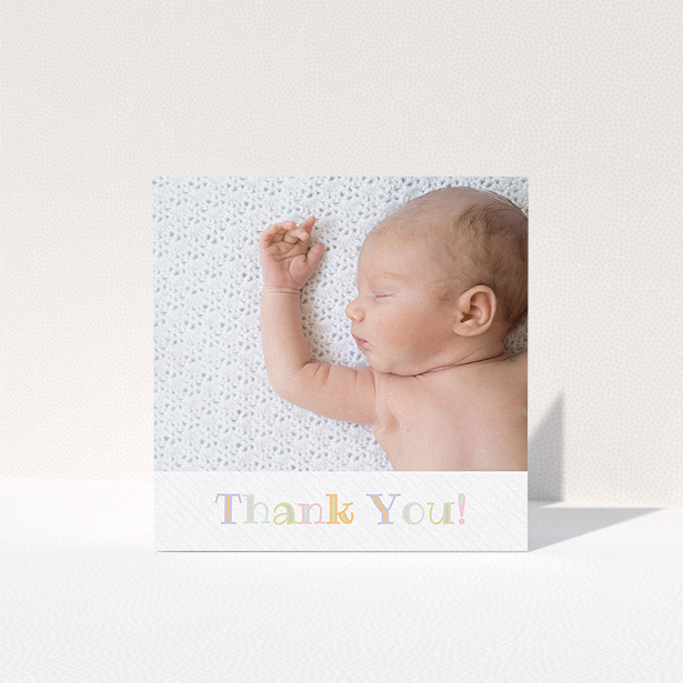 A baby thank you card design named "Pastel Thank You". It is a square (148mm x 148mm) card in a square orientation. It is a photographic baby thank you card with room for 1 photo. "Pastel Thank You" is available as a folded card, with tones of white and green.