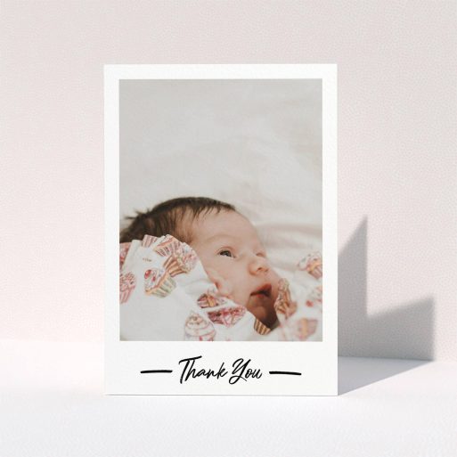 A baby thank you card called "Portrait Thank You Photo". It is an A5 card in a portrait orientation. It is a photographic baby thank you card with room for 1 photo. "Portrait Thank You Photo" is available as a folded card, with mainly white colouring.