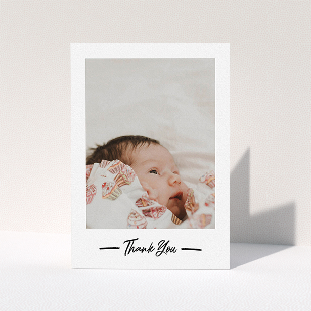 A baby thank you card called "Portrait Thank You Photo". It is an A5 card in a portrait orientation. It is a photographic baby thank you card with room for 1 photo. "Portrait Thank You Photo" is available as a folded card, with mainly white colouring.
