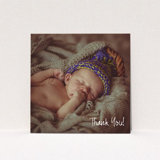A baby thank you card design called "Rough but Simple Photo". It is a square (148mm x 148mm) card in a square orientation. It is a photographic baby thank you card with room for 1 photo. "Rough but Simple Photo" is available as a flat card, with mainly white colouring.