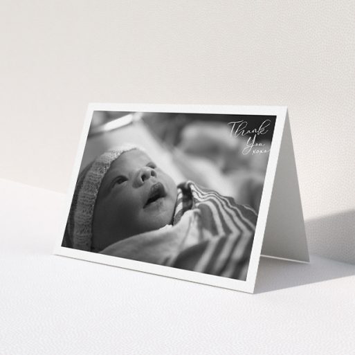 A baby thank you card design titled 'Simple Landscape Thanks'. It is an A5 card in a landscape orientation. It is a photographic baby thank you card with room for 1 photo. 'Simple Landscape Thanks' is available as a folded card, with mainly white colouring.