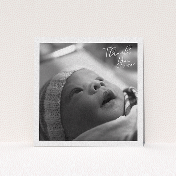 A baby thank you card design named "Simple Landscape Thanks". It is a square (148mm x 148mm) card in a square orientation. It is a photographic baby thank you card with room for 1 photo. "Simple Landscape Thanks" is available as a flat card, with mainly white colouring.