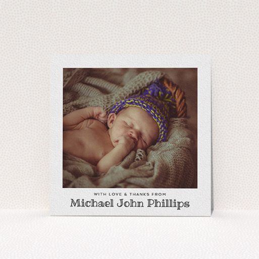 A baby thank you card design called "Simple Photo Frame". It is a square (148mm x 148mm) card in a square orientation. It is a photographic baby thank you card with room for 1 photo. "Simple Photo Frame" is available as a flat card, with mainly white colouring.