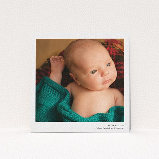 A baby thank you card named "Simple Portrait". It is a square (148mm x 148mm) card in a square orientation. It is a photographic baby thank you card with room for 1 photo. "Simple Portrait" is available as a flat card, with mainly white colouring.