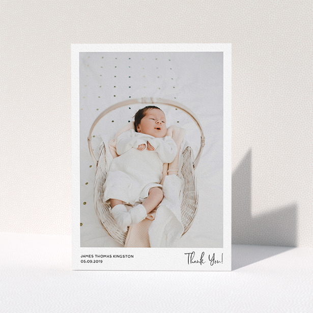 A baby thank you card design called "Simple Wedding Thank You". It is an A5 card in a portrait orientation. It is a photographic baby thank you card with room for 1 photo. "Simple Wedding Thank You" is available as a folded card, with mainly white colouring.